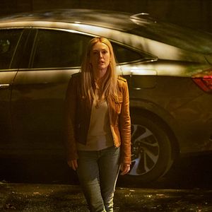 Foto La mujer en la ventana