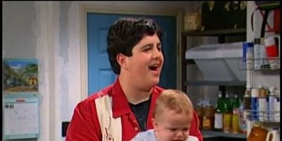 Cartel de Dos idiotas y un bebé