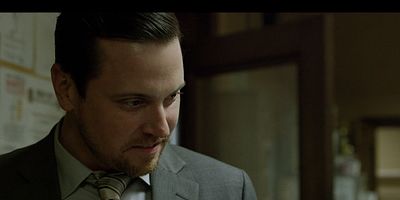 Cartel de A continuación