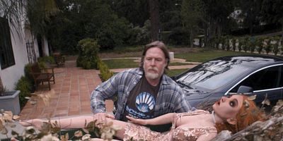 Cartel de Terrible Writer/Useless Sex Doll