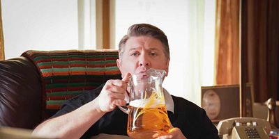 Cartel de German for Beginners and a Crazy Old Man with a Bat