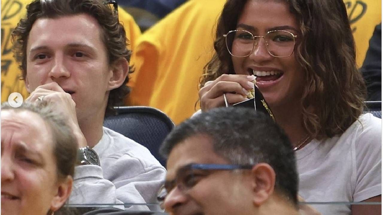 La pareja viendo Lakers vs Golden State Warriors