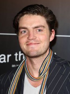 Póster Tom Burke