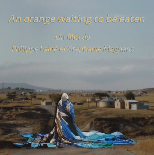 An orange waiting to be eaten : Póster